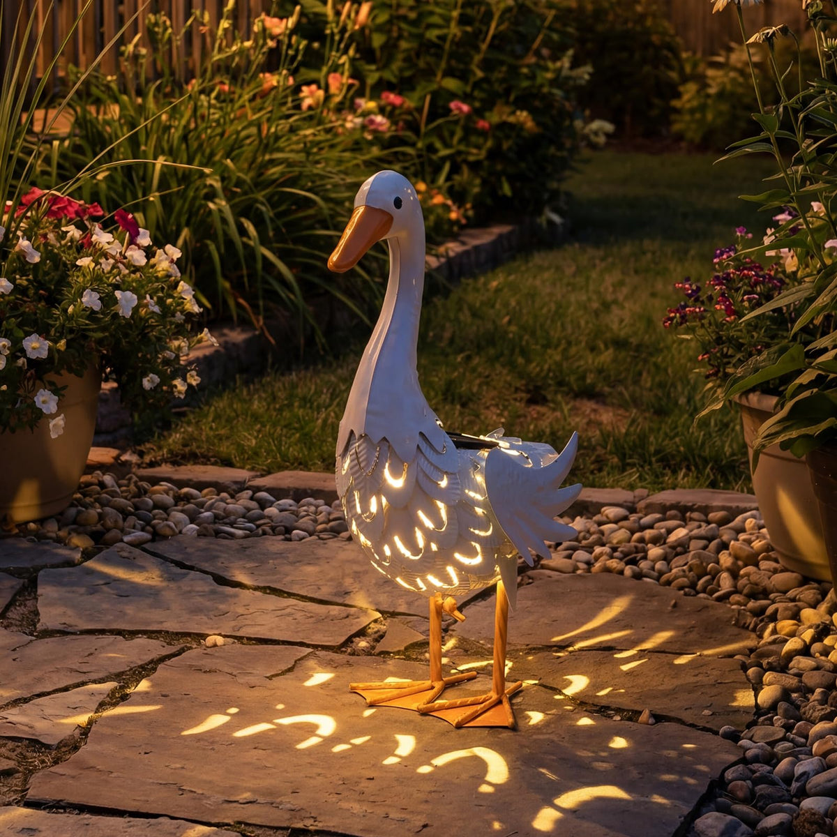 Lavezee rust-proof iron goose resists weather for year-round display.