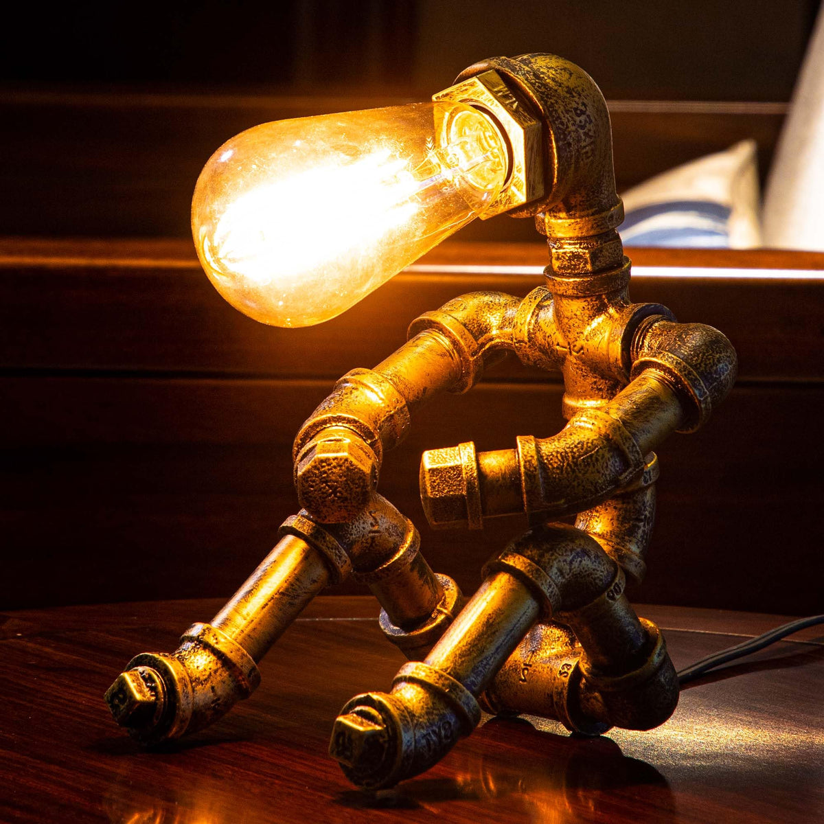 LCYY.TG industrial desk lamp with iron piping and handcrafted detailing.