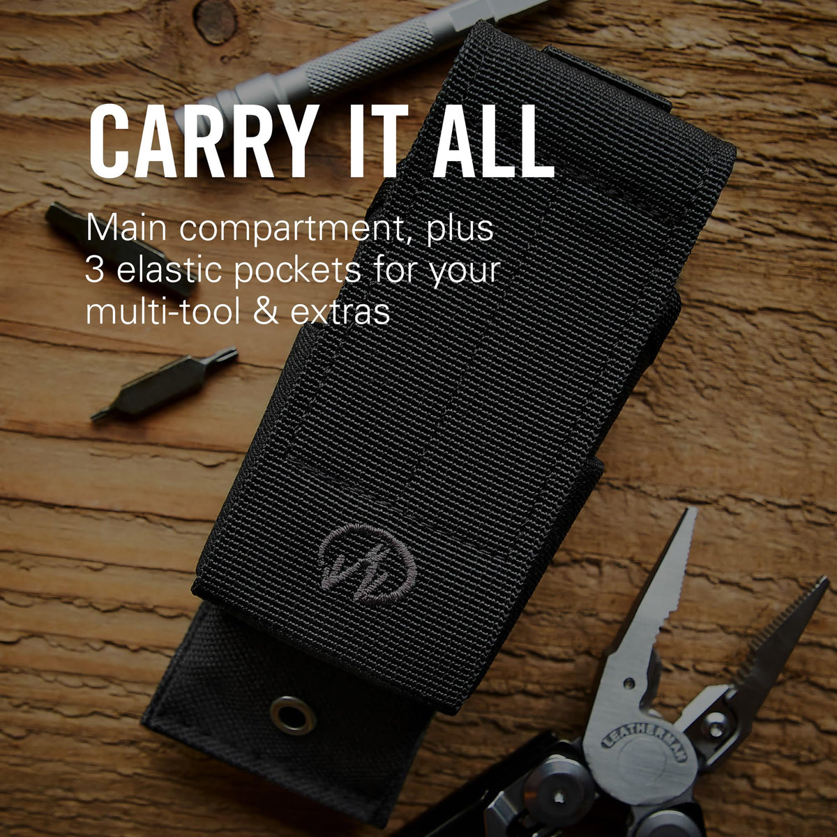Roomy main compartment holds Leatherman tools and bit extenders securely.