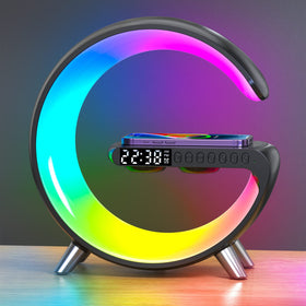 LeeNabao lamp with wireless charger on a nightstand for ambient light and charging.