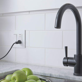 Sleek white Legrand Radiant GFCI outlet complements modern décor