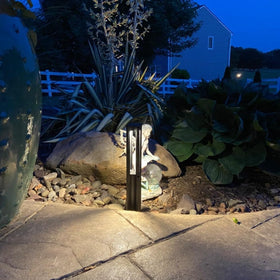 LEONLITE path light downward glow highlights a safe walkway at night