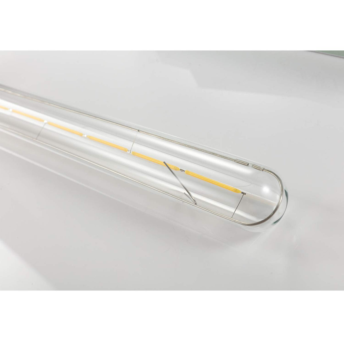 Dimmable LED filament bulb compatible with common dimmers for mood control.