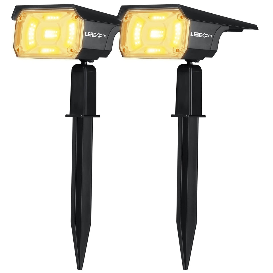 LEREKAM 40-LED spotlights illuminate a garden with warm white glow