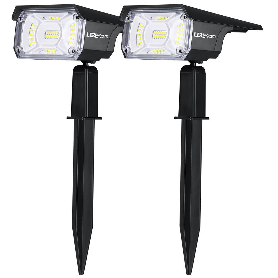 LEREKAM solar spotlights illuminate a tree at night for enhanced curb appeal.