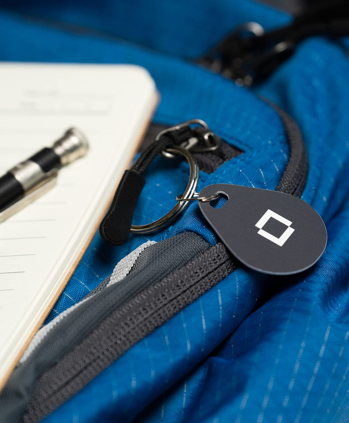 Level Key Fobs attached to a bag for easy access