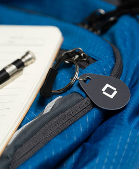 Level Key Fobs attached to a bag for easy access