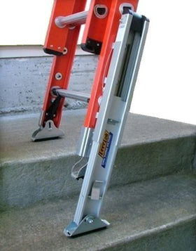 Base units mounted to ladder rails providing secure support on uneven ground