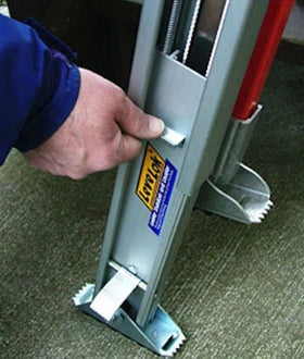 Levelok leveler in use on uneven ground improving ladder stability