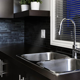 Leviton GFCI outlet positioned near water areas for NEC compliance