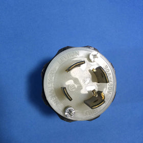 Leviton L16-30P locking plug in industrial setting emphasizes secure, grounded 3-phase power.