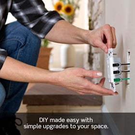 Leviton Lever Edge outlet termination click confirms a secure connection