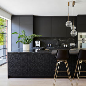 LEVOWAY black textured panels create a bold accent behind a sofa.