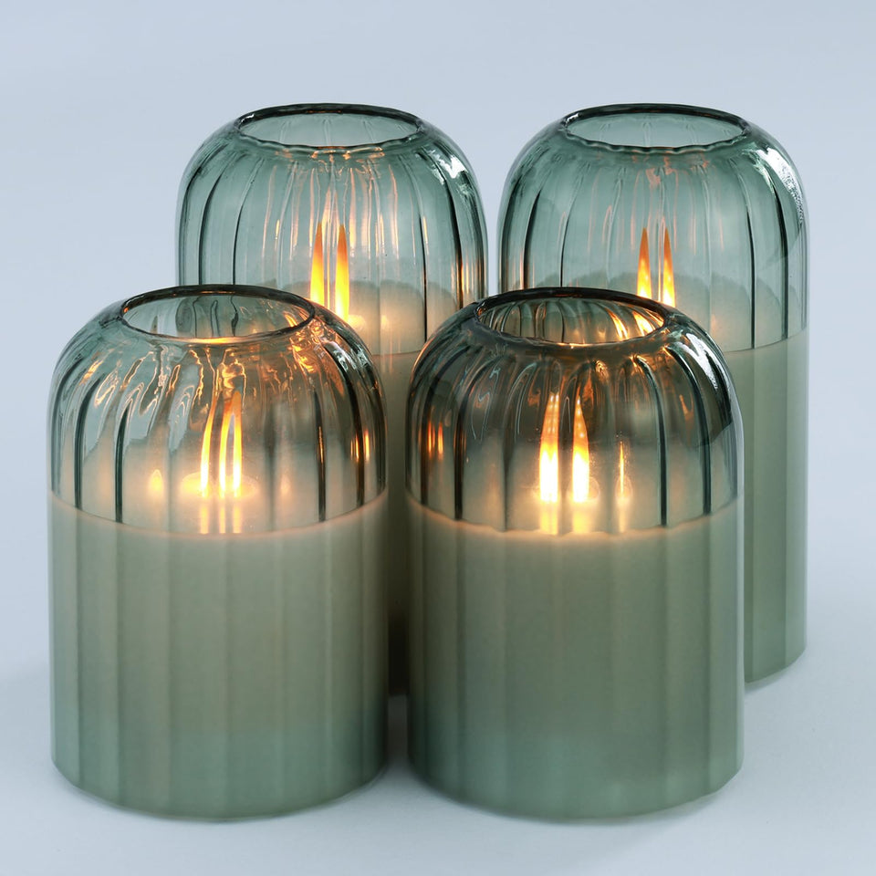 Lezonic glass flameless candles with remote sit on a table for cozy autumn ambiance