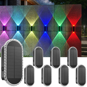LIANGLOME 8PK solar fence lights glowing warmly along a fence for safety and welcome.