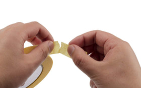 Lichamp yellow masking tape laid flat on a panel shows straight edge masking.