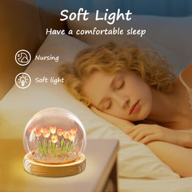Lifnatty pink tulips lamp on wood base brightens bedside tables.