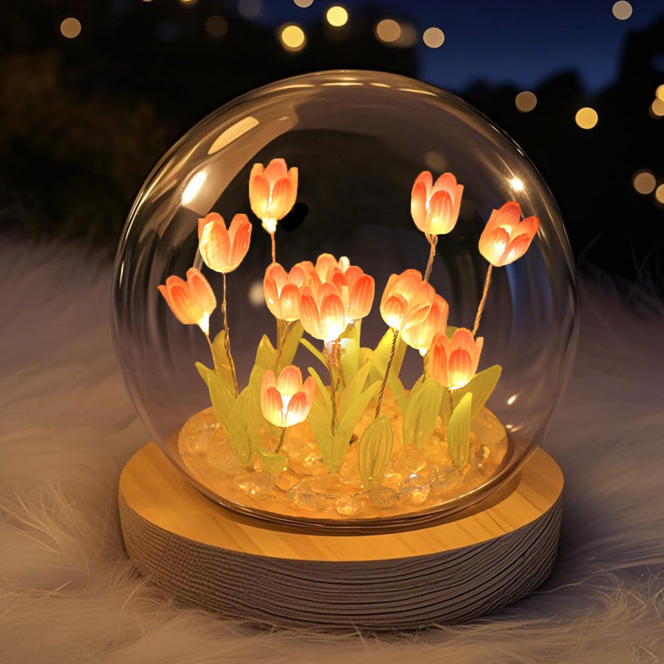 Lifnatty tulips lamp with pink glass dome creates soft bedroom ambience.