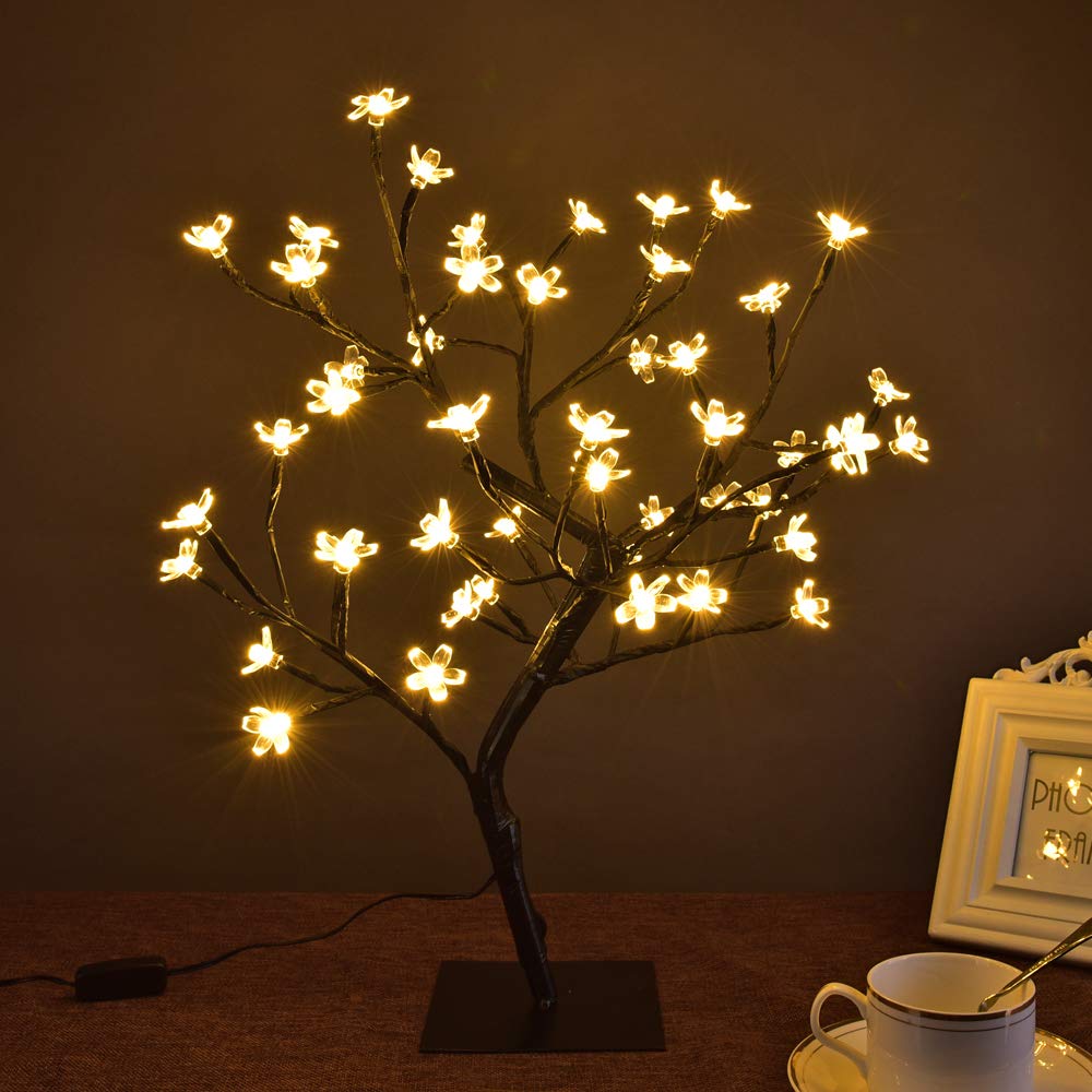 Lightshare rubberized cherry blossoms atop LEDs create a soft, inviting aura.