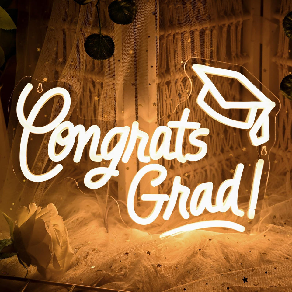 Lingqiang Congrats Grad Sign with graduation cap providing a warm white glow for a graduation party backdrop