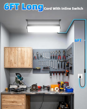 Linstaine 100W LED Shop Light on a lit workbench