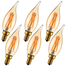 LiteHistory dimmable CA10 LED bulb in a chandelier creating warm amber ambiance