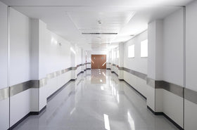 Compact profile Lithonia Quantum Emergency Light fits ceilings or walls in commercial spaces.