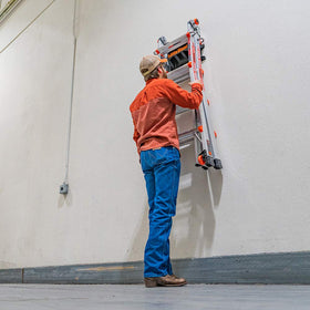 Little Giant Ladder Storage Rack in use in a garage for organized storage.