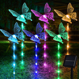 Liveasily butterfly lights outdoors illuminate the garden path with a gentle glow.