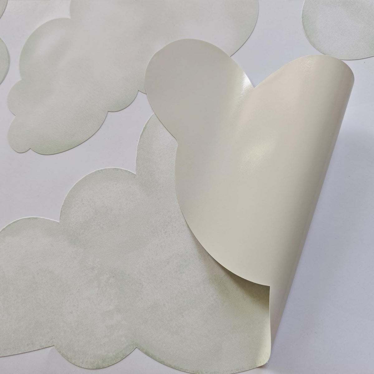 Liwo watercolor clouds brighten kids' playrooms with a soft, inviting sky theme