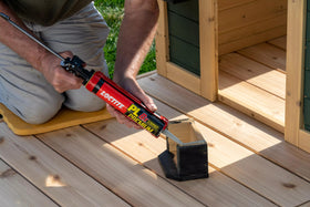 Loctite PL Premium Fast Grab bonds wet or frozen wood with extended repositioning time.