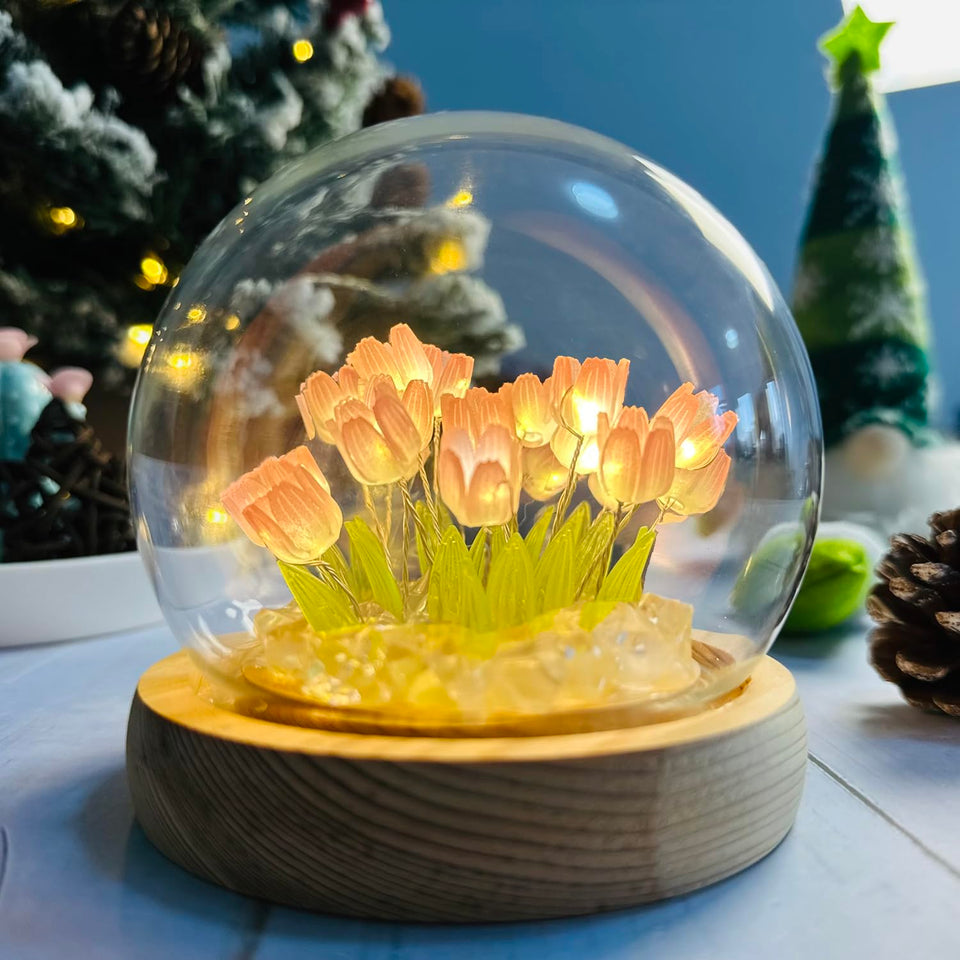 LOGAZOO tulip lamp with glass dome and 20 LEDs creates a warm bedside glow.