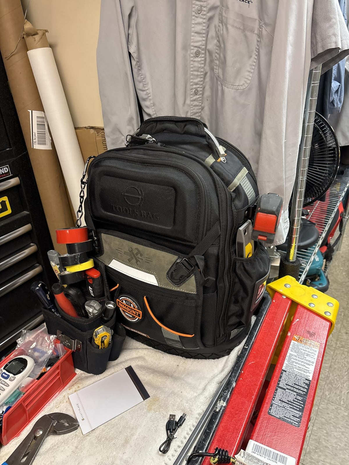 LOKASS Tool Backpack durable waterproof base protects gear in wet conditions.