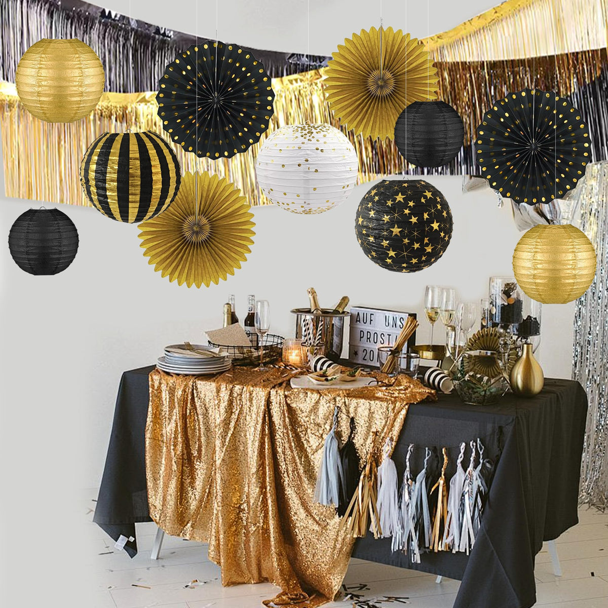 LOMOSO black and gold lanterns with patterned details for chic décor.