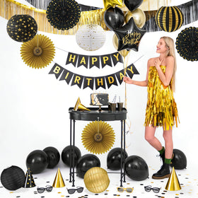 LOMOSO black and gold streamer creates dramatic lines across space.