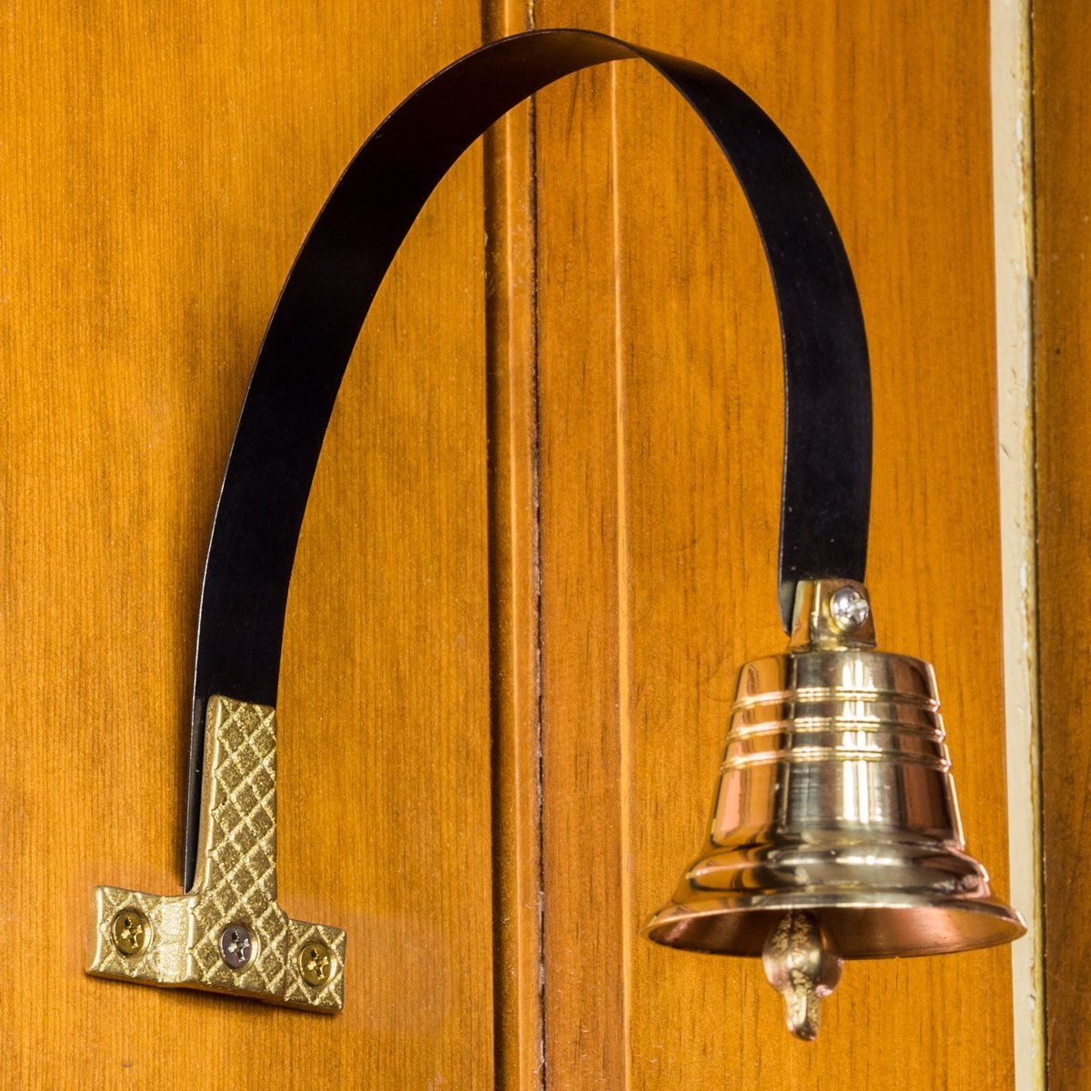 Lone Star Art solid brass door bell showcases durable construction and bold tone.