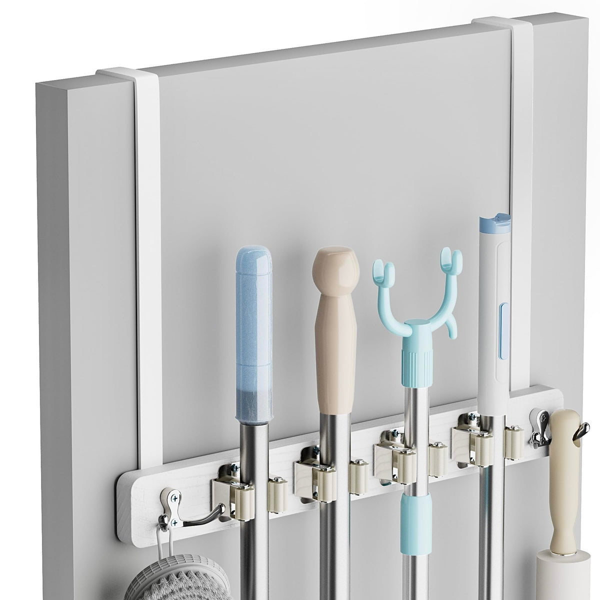 Lorbro over-door broom holder for easy tool access without wall damage.