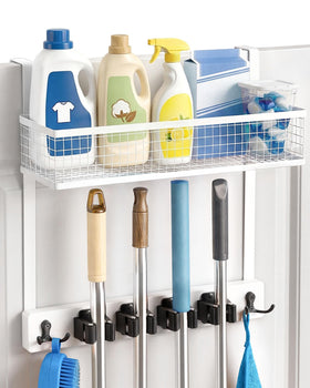 Lorbro over-door broom holder keeps tools accessible and organized.