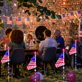 LORRYTE night glow enhances pathways with red, white, and blue accents.