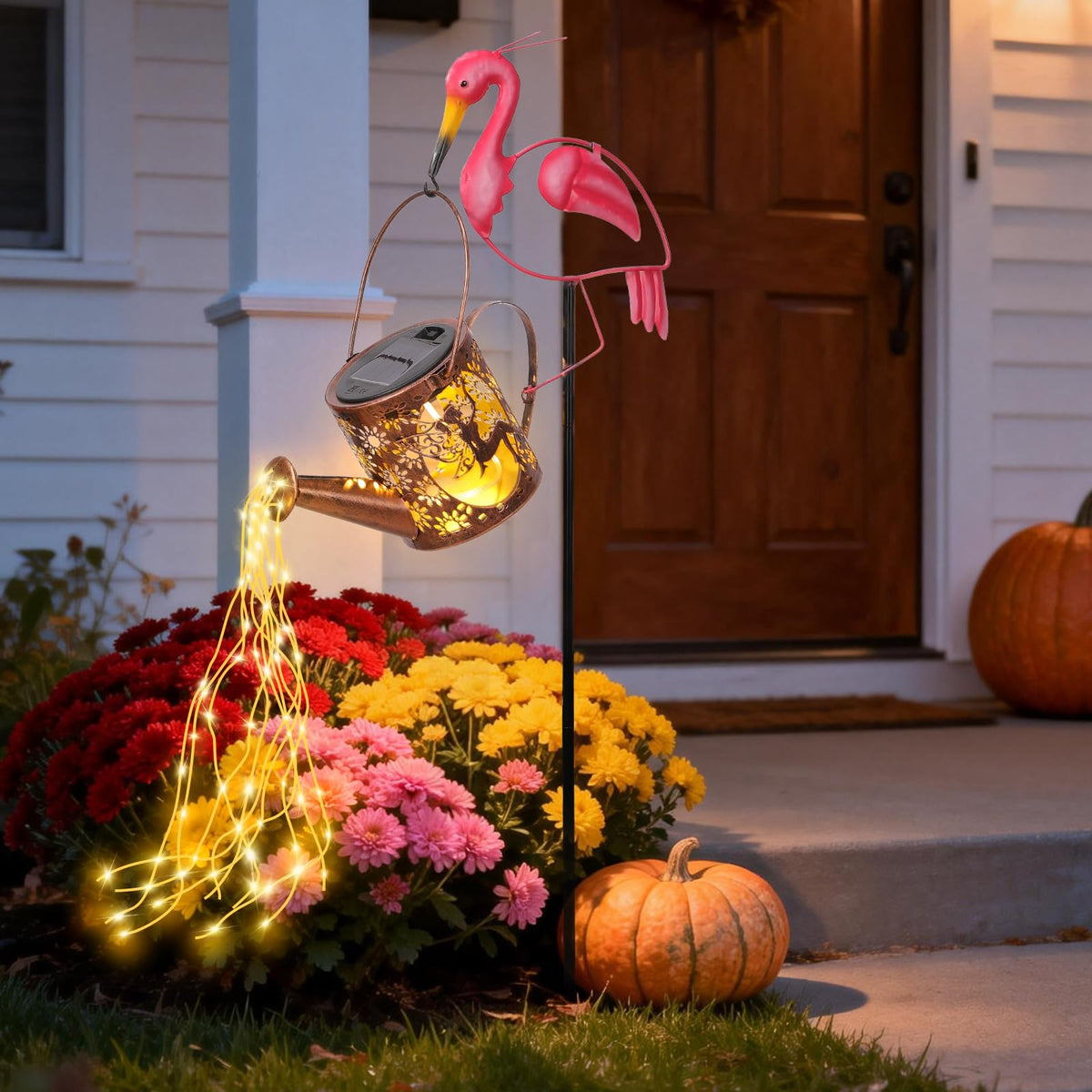 LOVERUIS Flamingo solar watering can light brightens the garden with daytime charm and soft night glow.