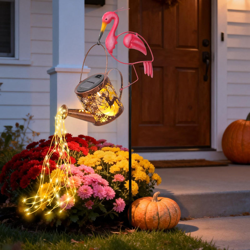 LOVERUIS Flamingo solar watering can light brightens the garden with daytime charm and soft night glow.