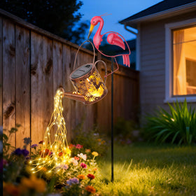 LOVERUIS Flamingo statue shows resin texture and sun-powered illumination.