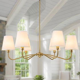 LOZOHOM brass gold chandelier with white fabric shade over dining table for warm ambience.