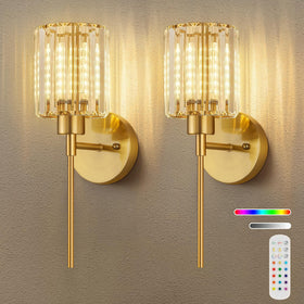 LPAIRO crystal wall sconce with brushed gold finish illuminates living spaces with warm ambient light.