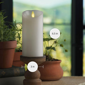 Luminara battery-operated timer pillar candle with auto-off feature.