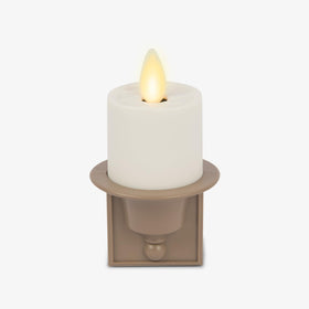 Luminara flameless candle night light with dusk-to-dawn sensor for automatic illumination.