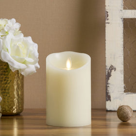 Luminara flameless ivory pillar candle with moving flame for safe, realistic ambiance.