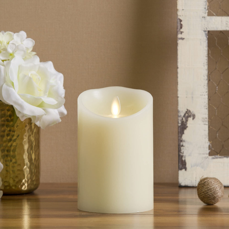 Luminara flameless ivory pillar candle with moving flame for safe, realistic ambiance.