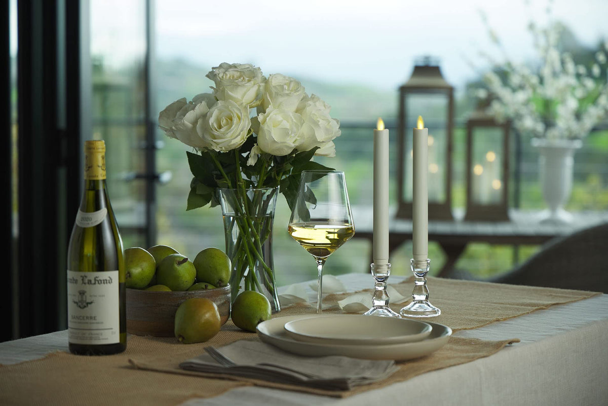 Luminara flameless LED tapers emit warm white light for safe indoor use