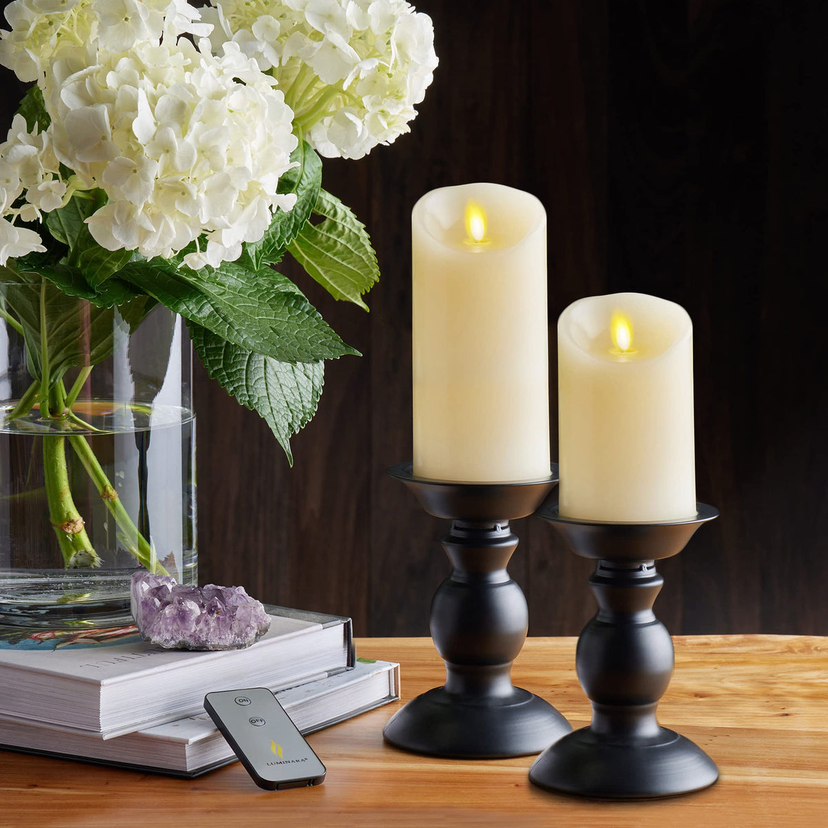 Luminara 3-inch ivory pillar candle with wax texture and lifelike flicker.